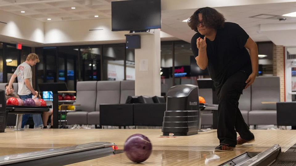 Thumbnail content for the article: 'Students score with free bowling on East Campus'